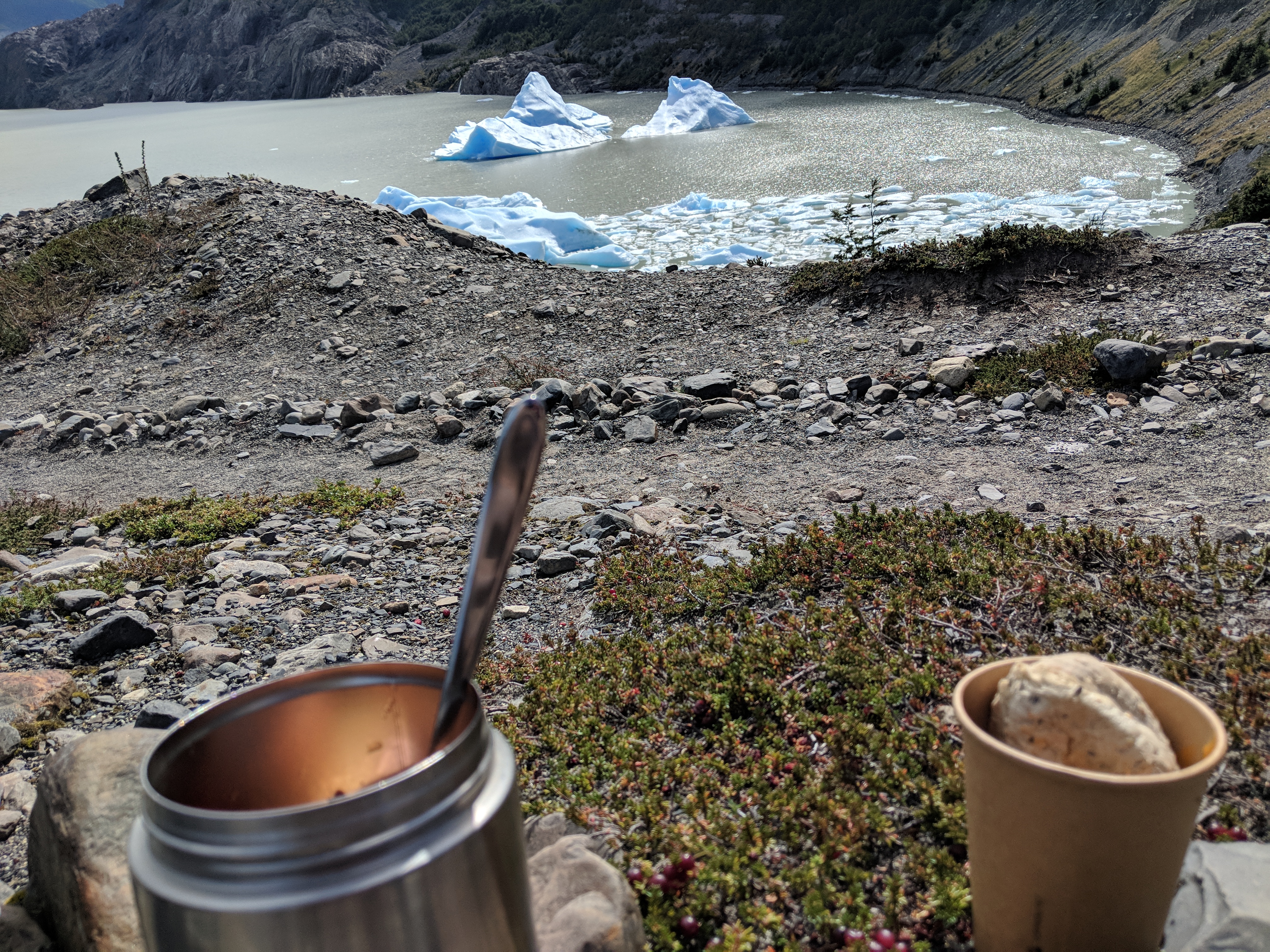 Stopping to eat lunch in front of a lake en-route to Gray Glacier in Patagonia.